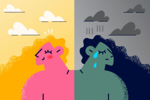 Colorful drawing of two women. On the right is a woman who seems happy and is basking in the sun. On the left is a woman who seems depressed and is surrounded by a rainy and cloudy, grey sky.