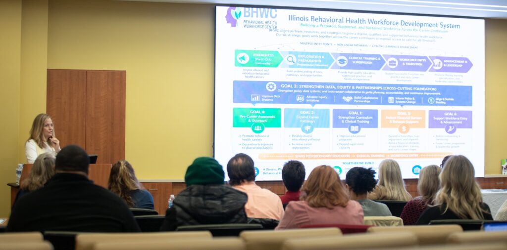 BHWC Executive Director Dr. Cynthia Baker presents Illinois’ behavioral health workforce development system to event attendees.